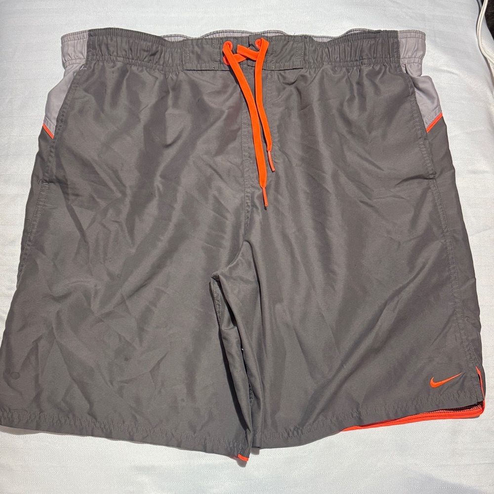 Nike Gray Shorts with Orange Swoosh and Trim